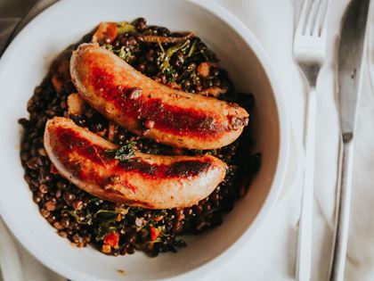 Puy Lentils with Sausages & Streaky Bacon image